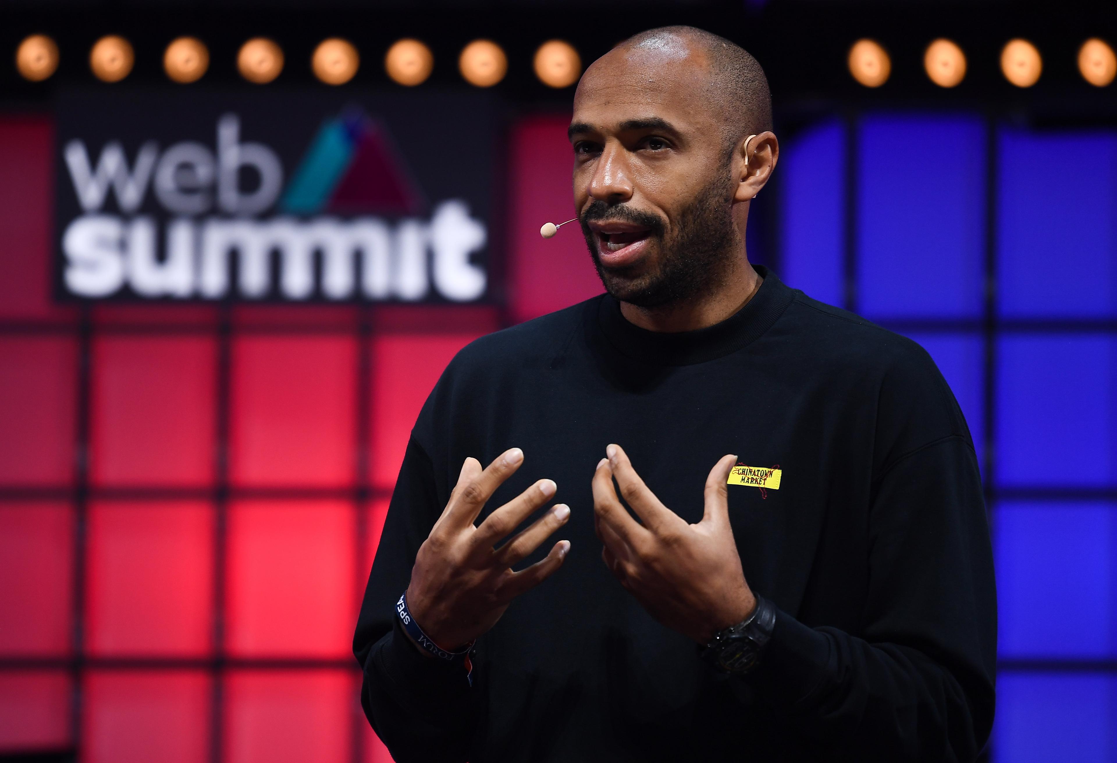 Thierry Henry speaking on stage at Web Summit, 2021