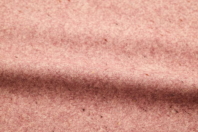 Close-up of soft pink wool fabric